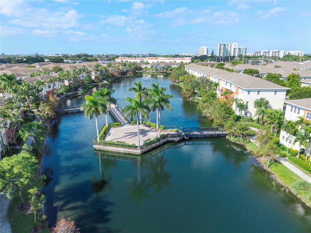 163 Southwest 7th Street Pompano Beach, FL 33060 - Photo 47 of 54 a view of a lake with a yard