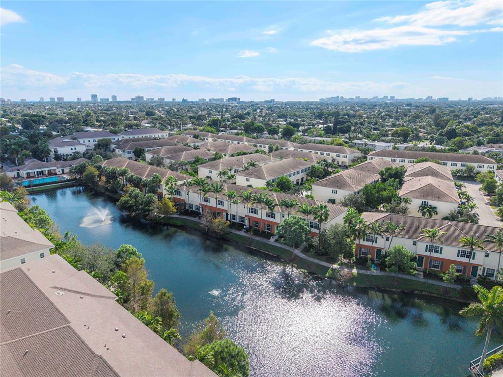 163 Southwest 7th Street Pompano Beach, FL 33060 - Photo 52 of 54 an aerial view of residential houses with outdoor space and lake view