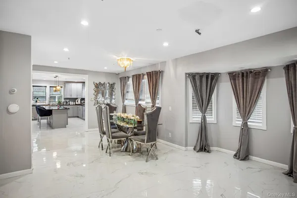 a dining room with furniture and a table