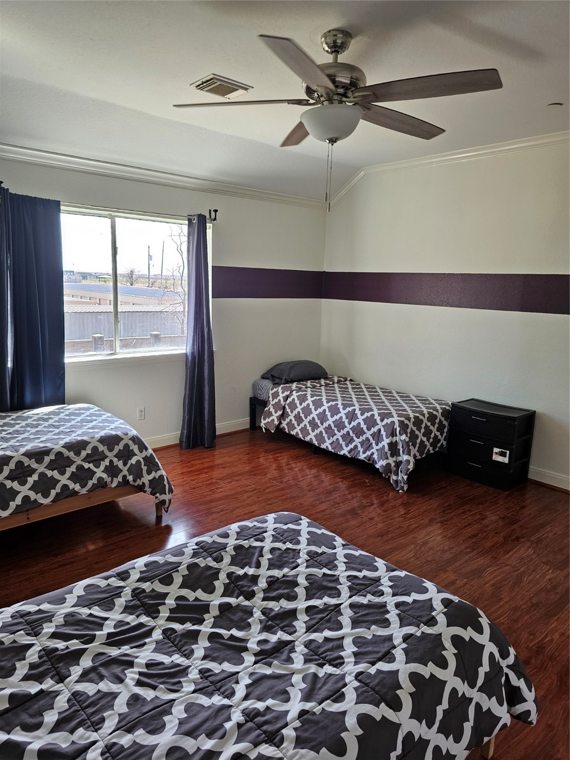 1211 Lark Lane Richmond, TX 77469 - Photo 17 of 24 a bedroom with a bed and a window