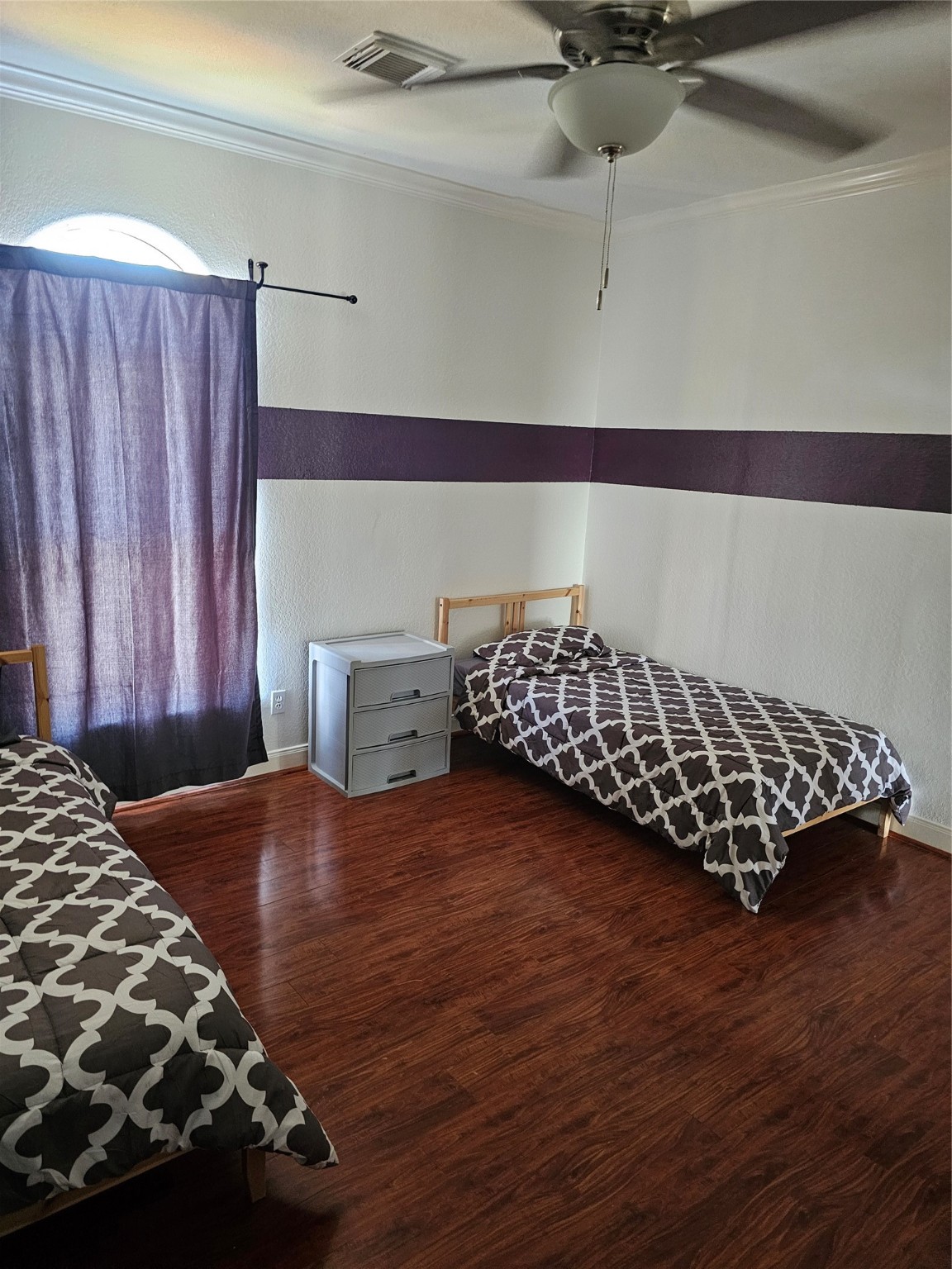 1211 Lark Lane Richmond, TX 77469 - Photo 23 of 24 a bedroom with a bed and a window