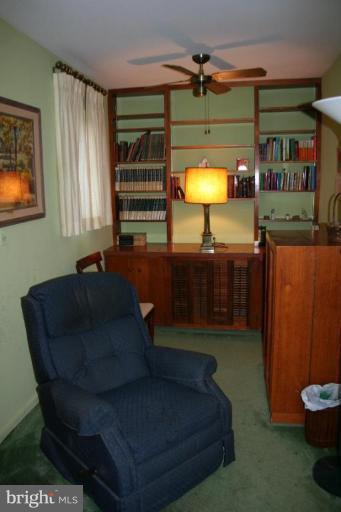 5903 Greentree Road Bethesda, MD 20817 - Photo 4 of 19 a living room with furniture and a window