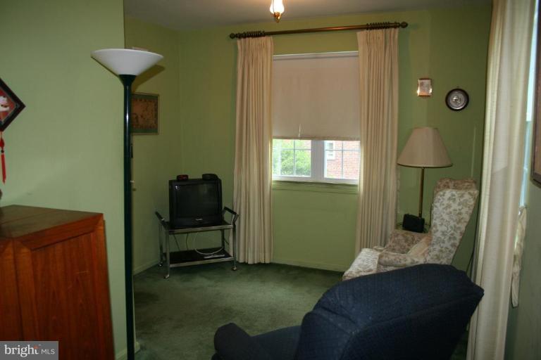 5903 Greentree Road Bethesda, MD 20817 - Photo 5 of 19 a living room with furniture and a window