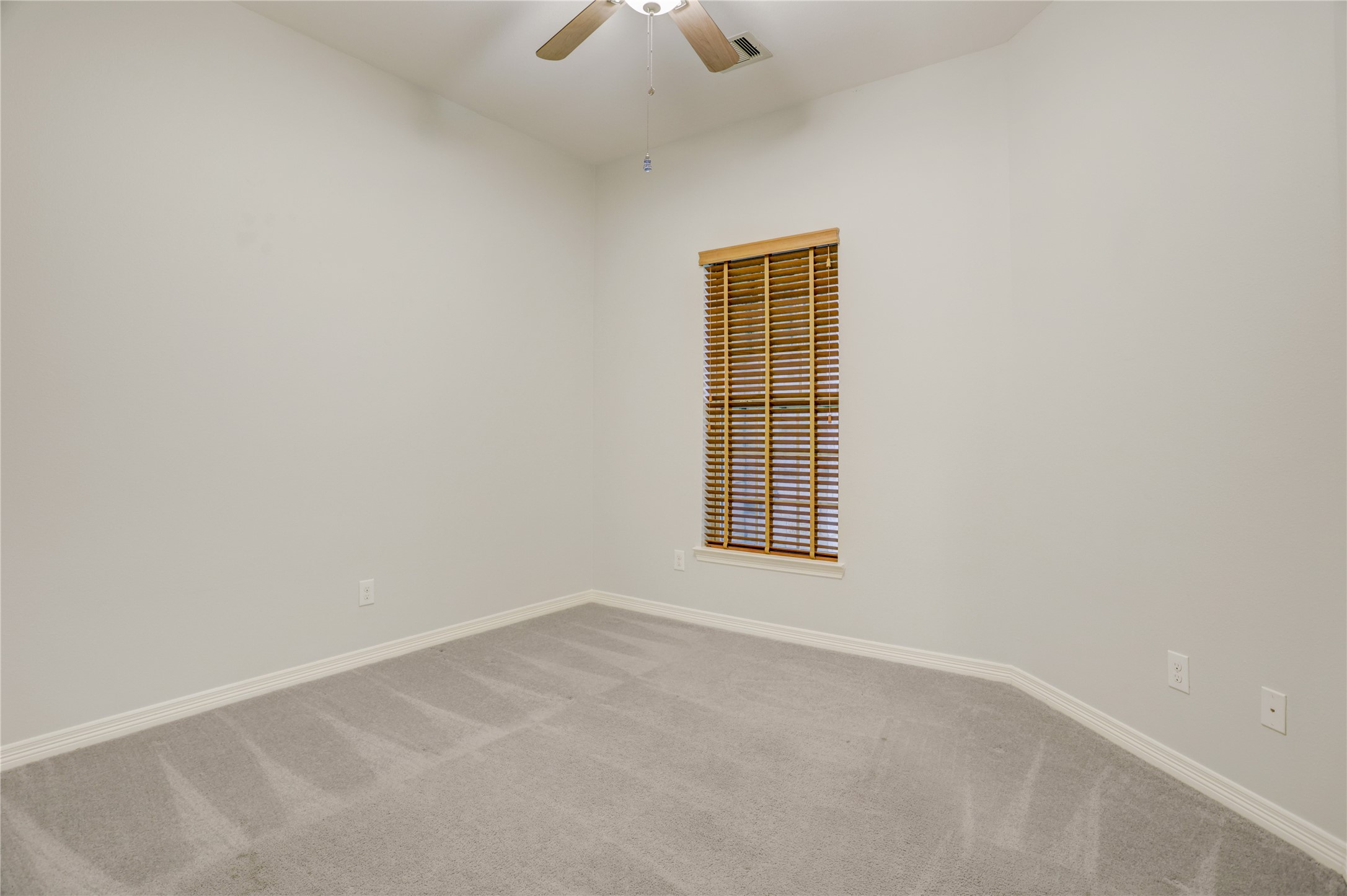 3002 Currant Drive Manvel, TX 77578 - Photo 28 of 43 an empty room with a window