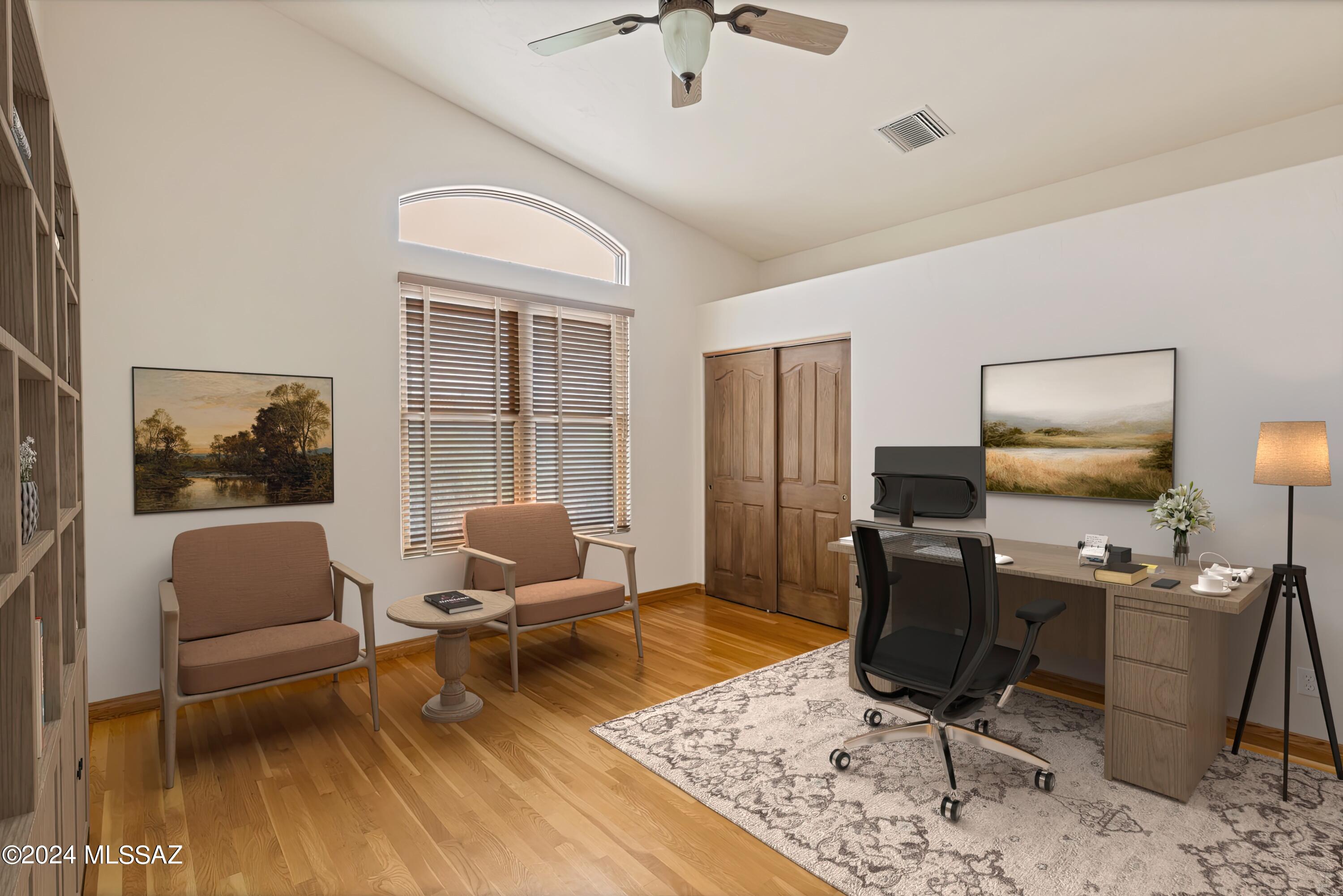4001 North Harrison Road Tucson, AZ 85749 - Photo 25 of 50 a living room with furniture or couch and a flat screen tv