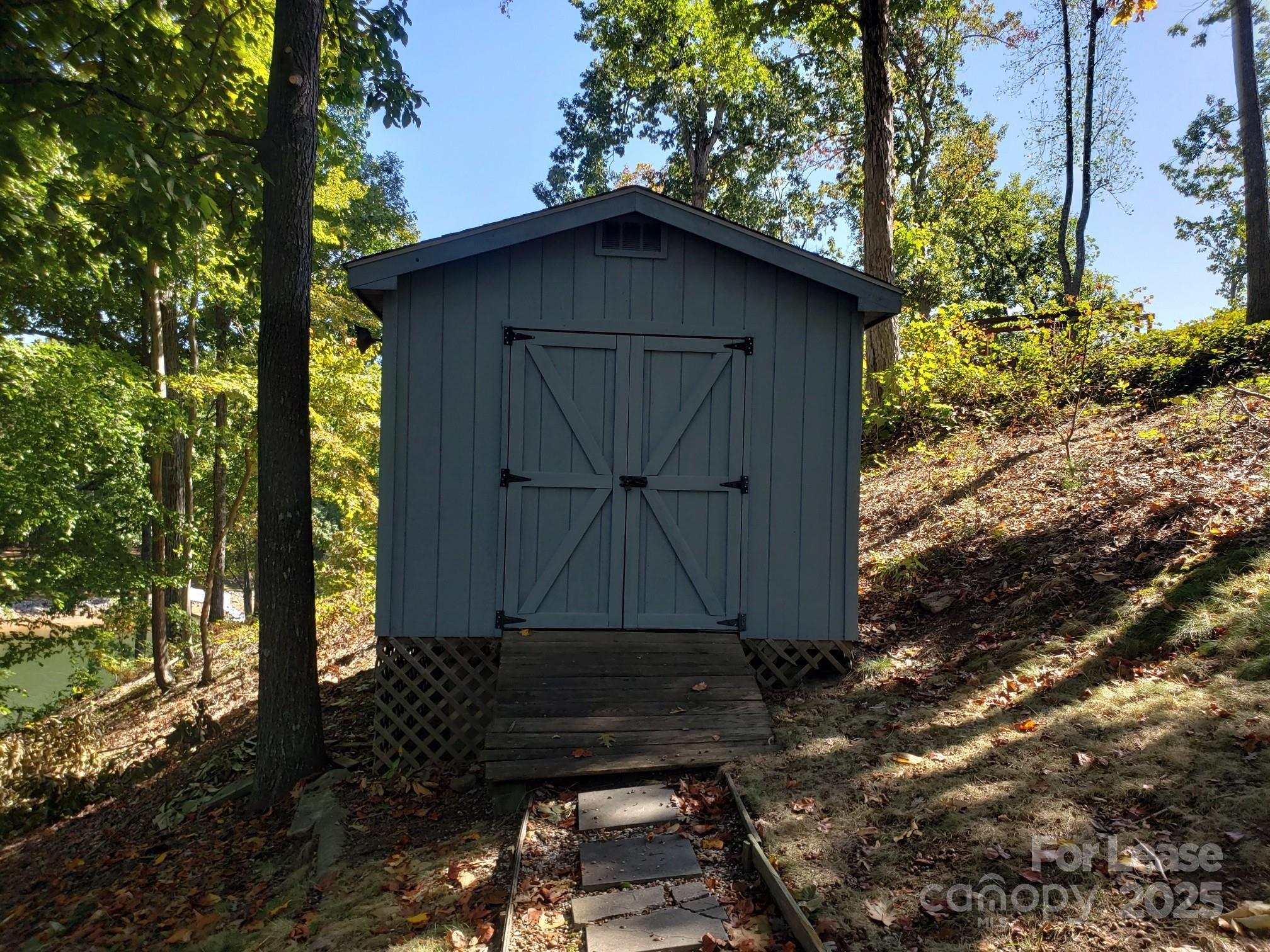 232 Hermance Lane Mooresville, NC 28117 - Photo 21 of 21 a house with trees in the background