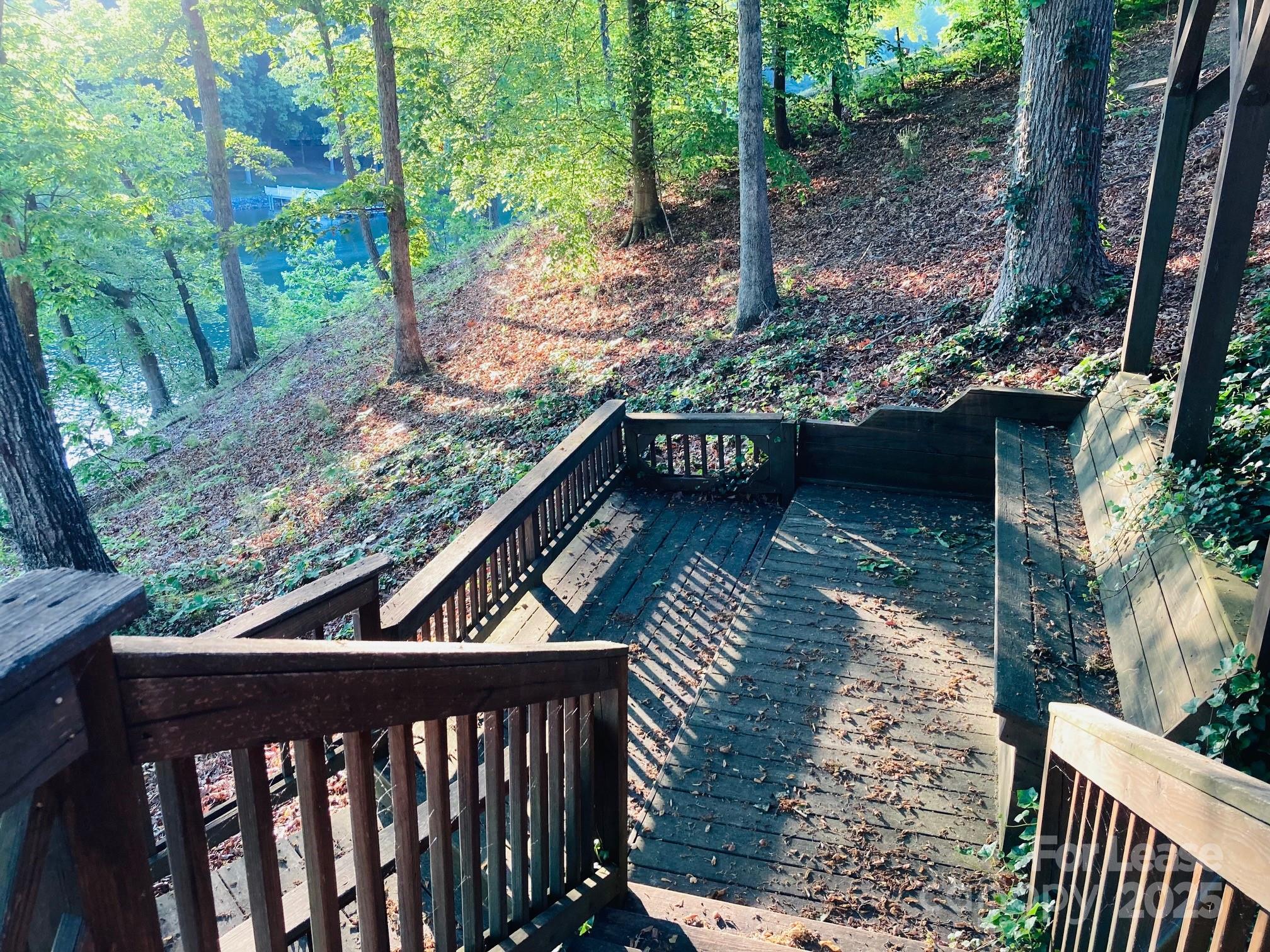 232 Hermance Lane Mooresville, NC 28117 - Photo 4 of 21 a balcony with wooden floor and outdoor space