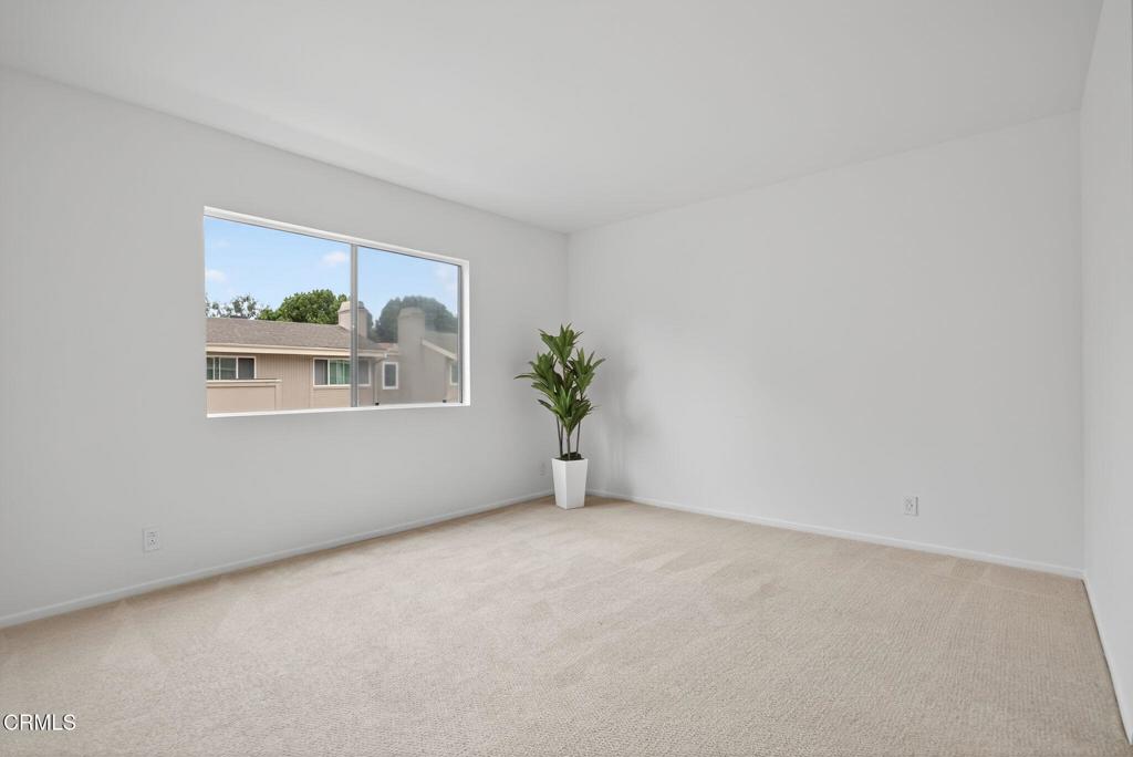 1466 San Simeon Court, Unit 2 Ventura, CA 93003 - Photo 24 of 41 a view of an empty room with painting on the wall