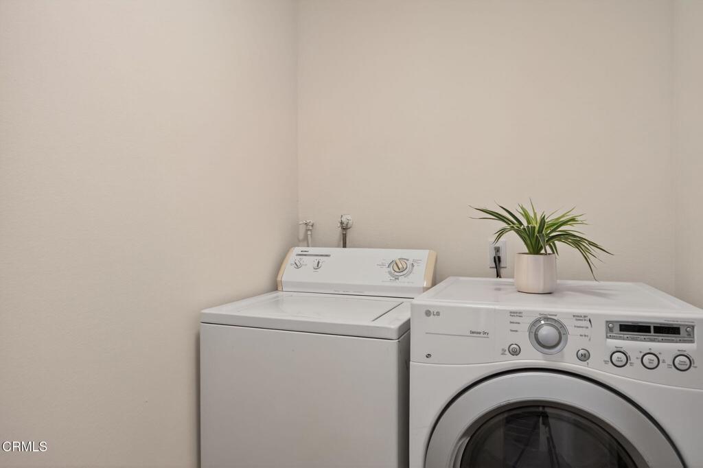 1466 San Simeon Court, Unit 2 Ventura, CA 93003 - Photo 4 of 41 a utility room with dryer and washer