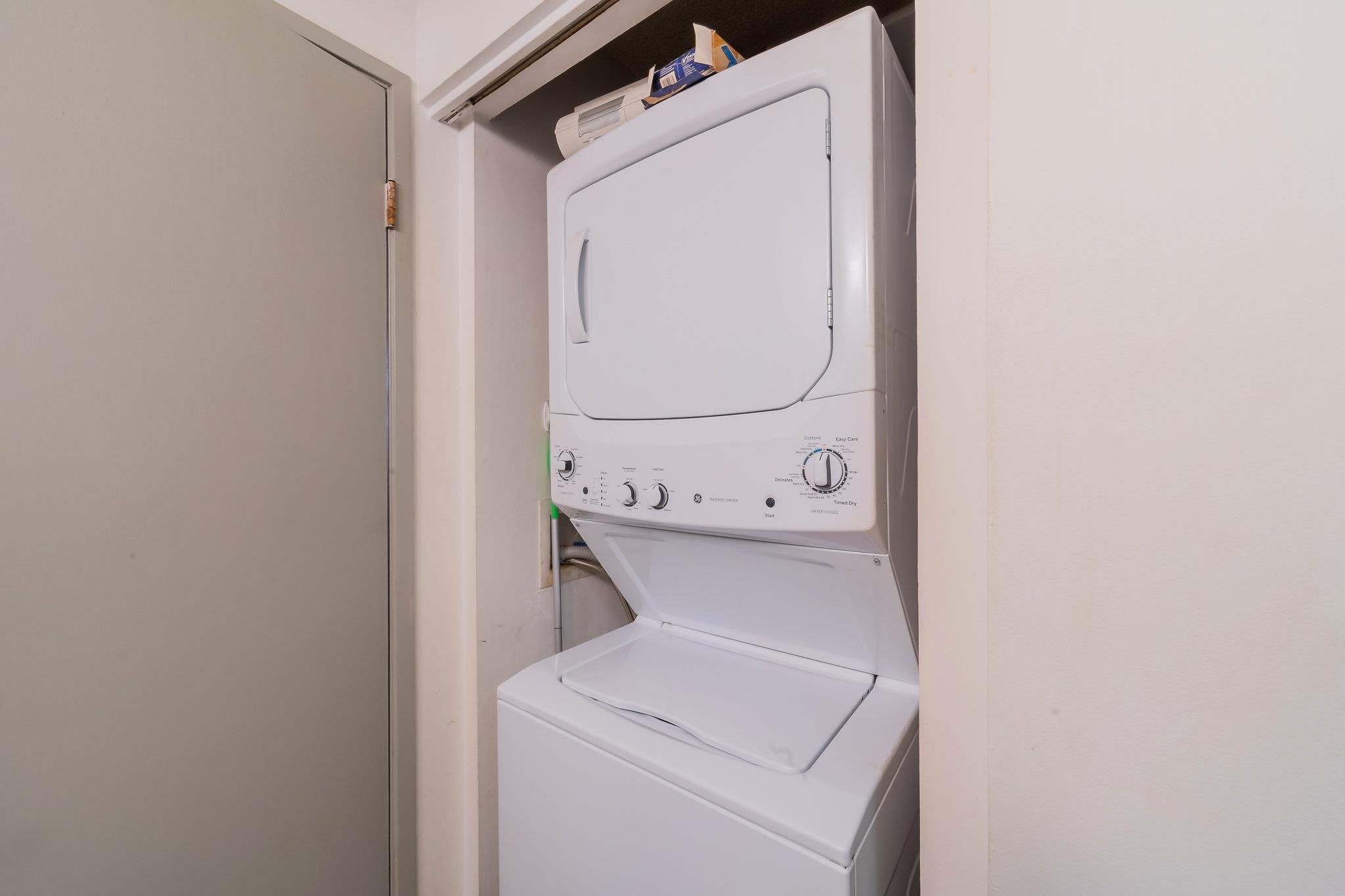 4310 Lower Honoapiilani Road, Unit 419 Lahaina, HI 96761 - Photo 17 of 32 a utility room with dryer and washer