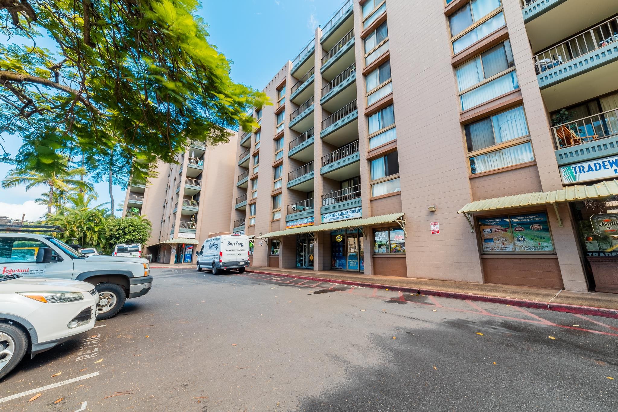 4310 Lower Honoapiilani Road, Unit 419 Lahaina, HI 96761 - Photo 31 of 32 a view of a street that has couple of cars parked on the road