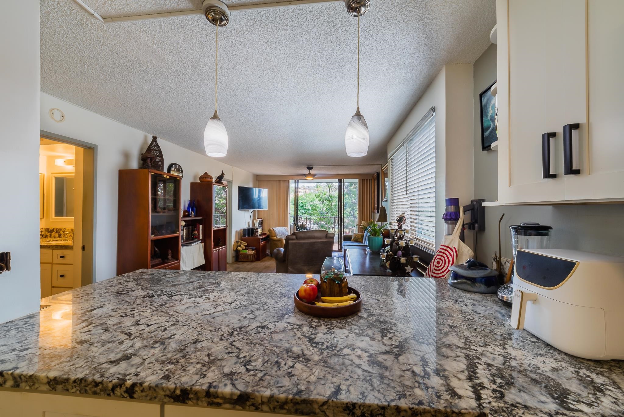 4310 Lower Honoapiilani Road, Unit 419 Lahaina, HI 96761 - Photo 6 of 32 a view of a room with gym equipment