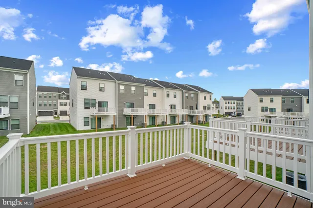 a view of a large building from a balcony