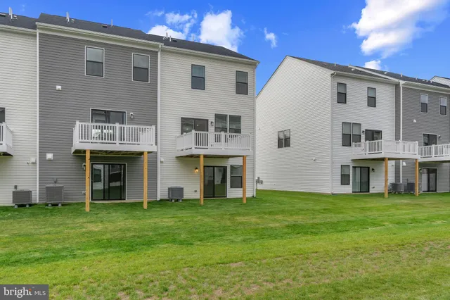 a big house with a big yard and more windows