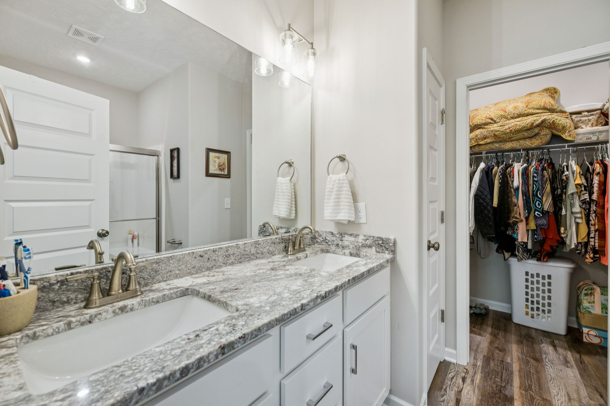 143 Creek Wood Road Manchester, TN 37355 - Photo 15 of 29 a bathroom with a granite countertop sink and a mirror