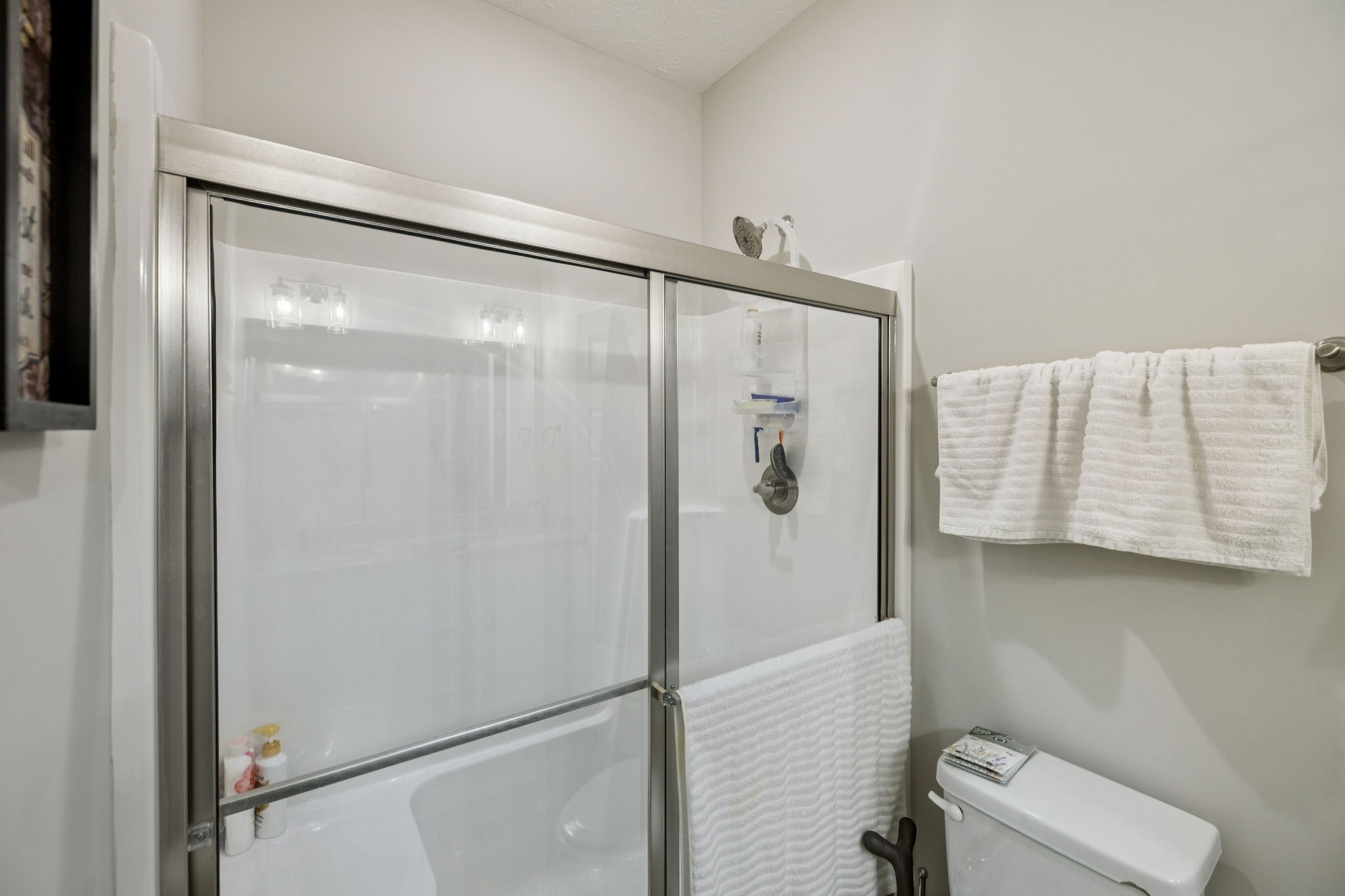 143 Creek Wood Road Manchester, TN 37355 - Photo 16 of 29 a bathroom with a glass shower door