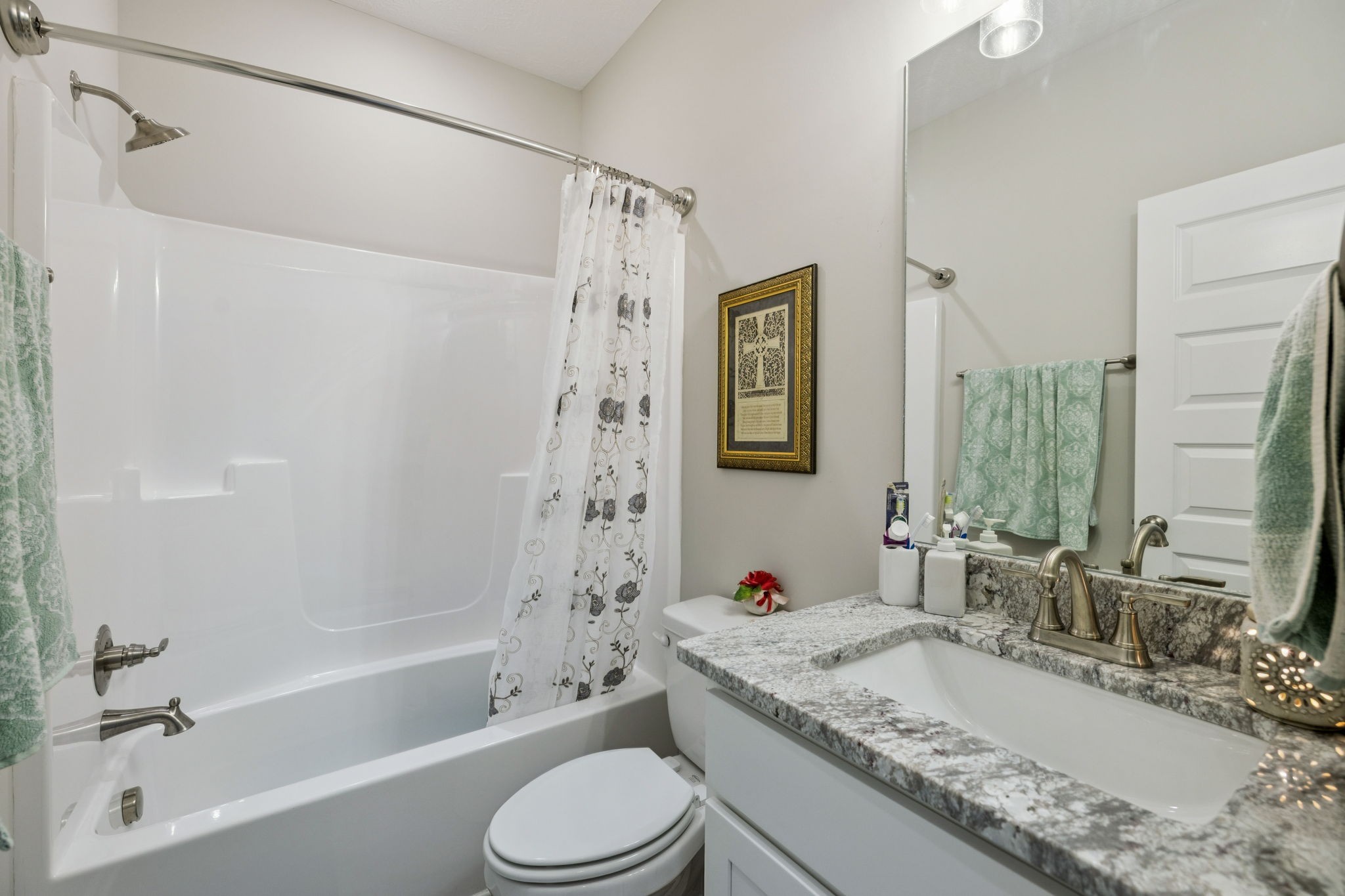 143 Creek Wood Road Manchester, TN 37355 - Photo 19 of 29 a bathroom with a granite countertop sink toilet and shower