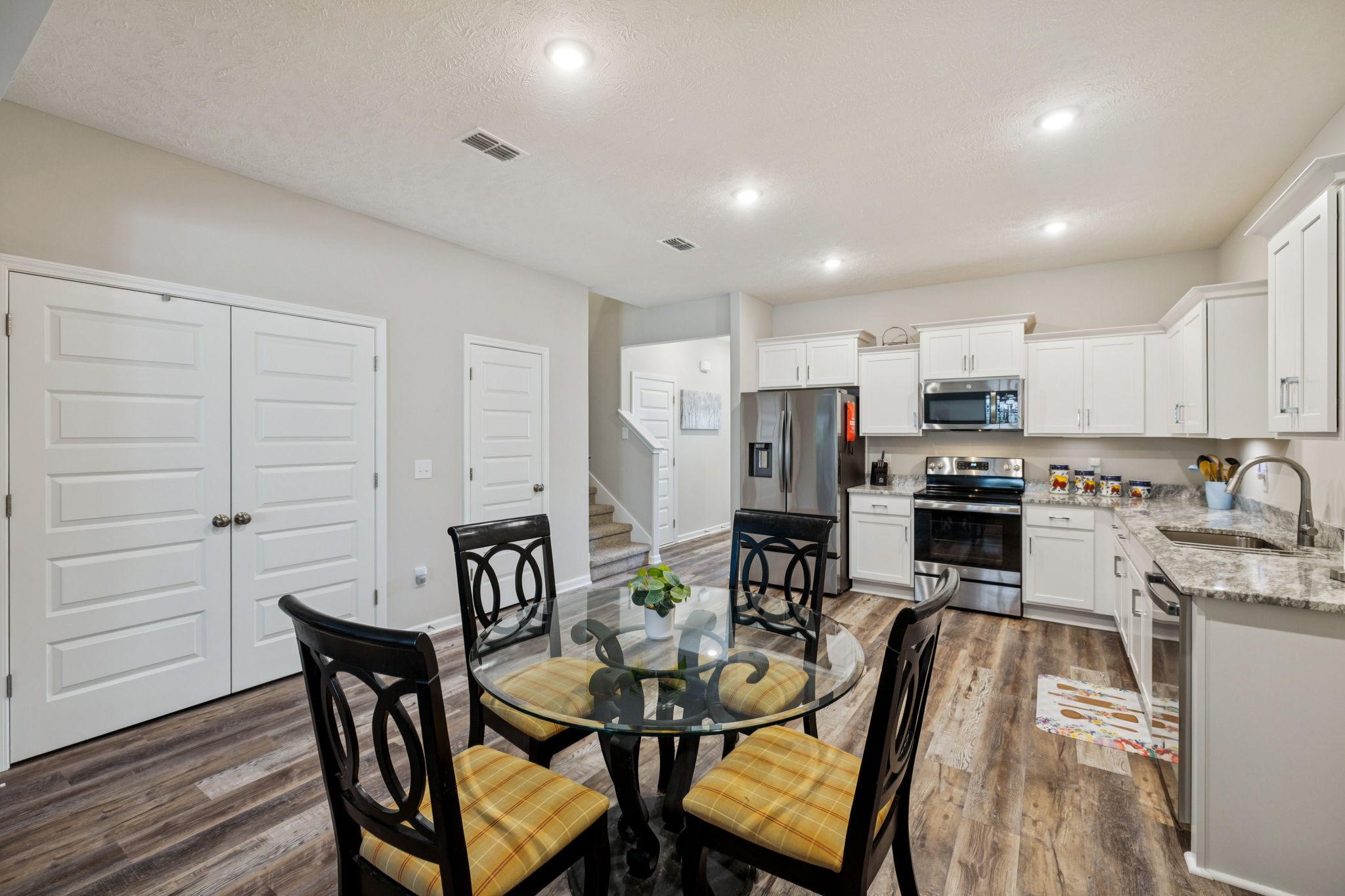 143 Creek Wood Road Manchester, TN 37355 - Photo 8 of 29 a view of a dining room with furniture and wooden floor