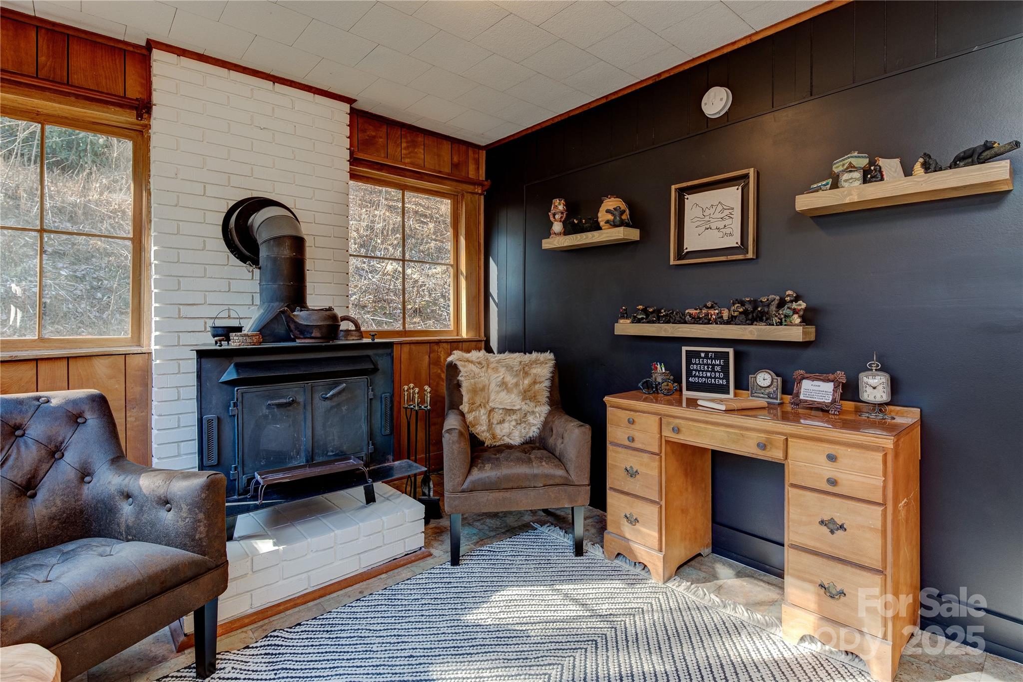 4050 Pickens Highway Rosman, NC 28772 - Photo 1 of 31 a living room with furniture and wooden floor