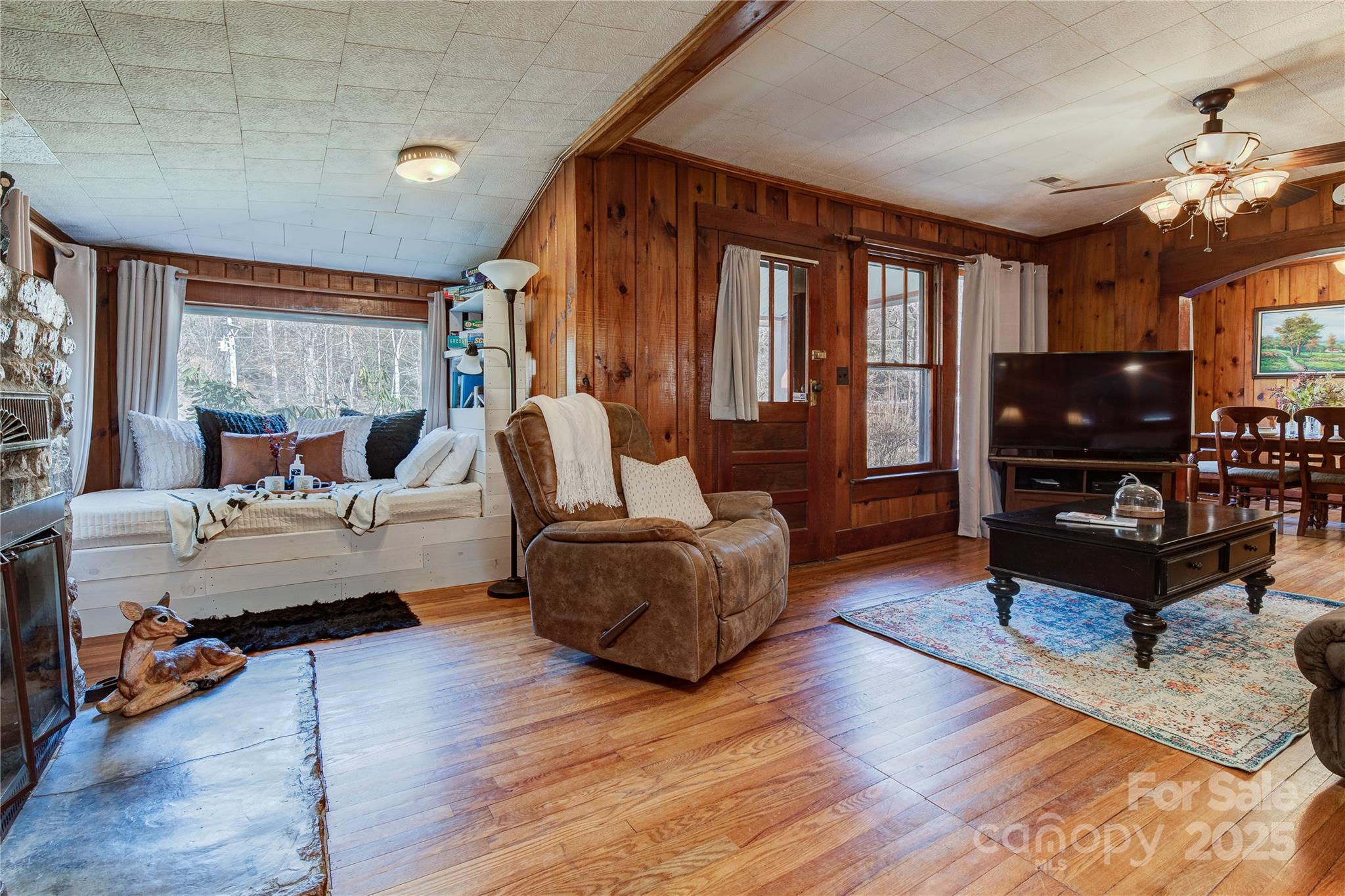 4050 Pickens Highway Rosman, NC 28772 - Photo 19 of 31 a living room with furniture and a flat screen tv
