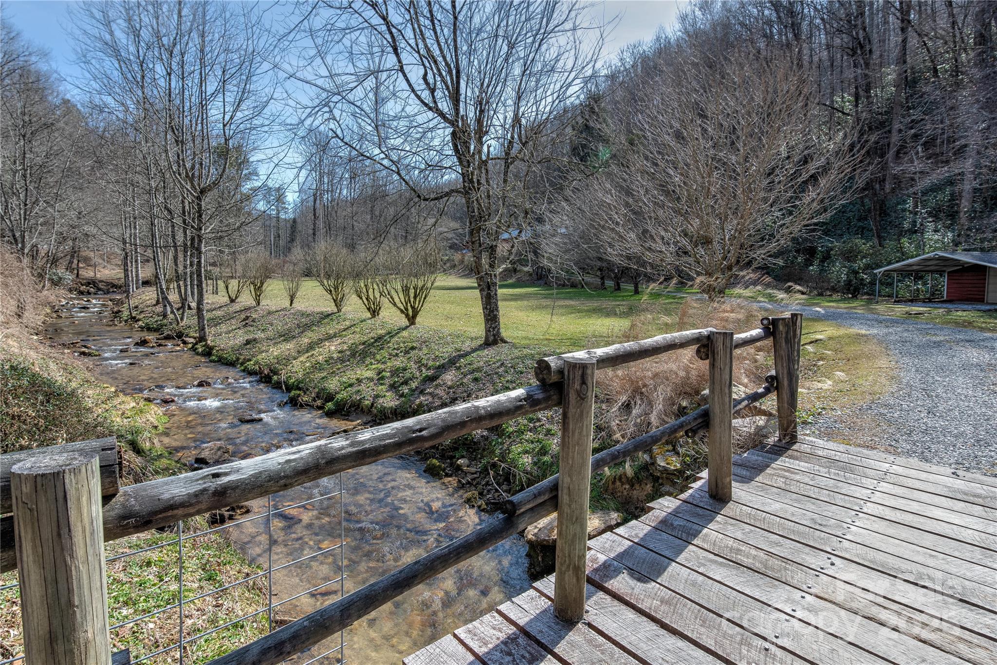 4050 Pickens Highway Rosman, NC 28772 - Photo 22 of 31 a view of a wooden bridge