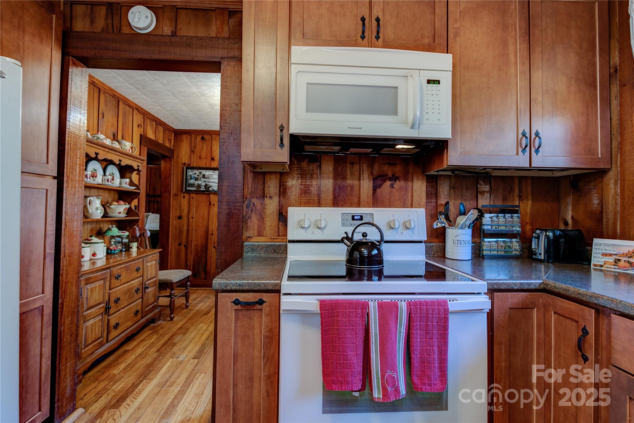 4050 Pickens Highway Rosman, NC 28772 - Photo 10 of 31 a kitchen with stainless steel appliances granite countertop a stove and cabinets