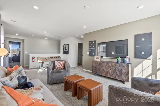 a living room with furniture and a couch