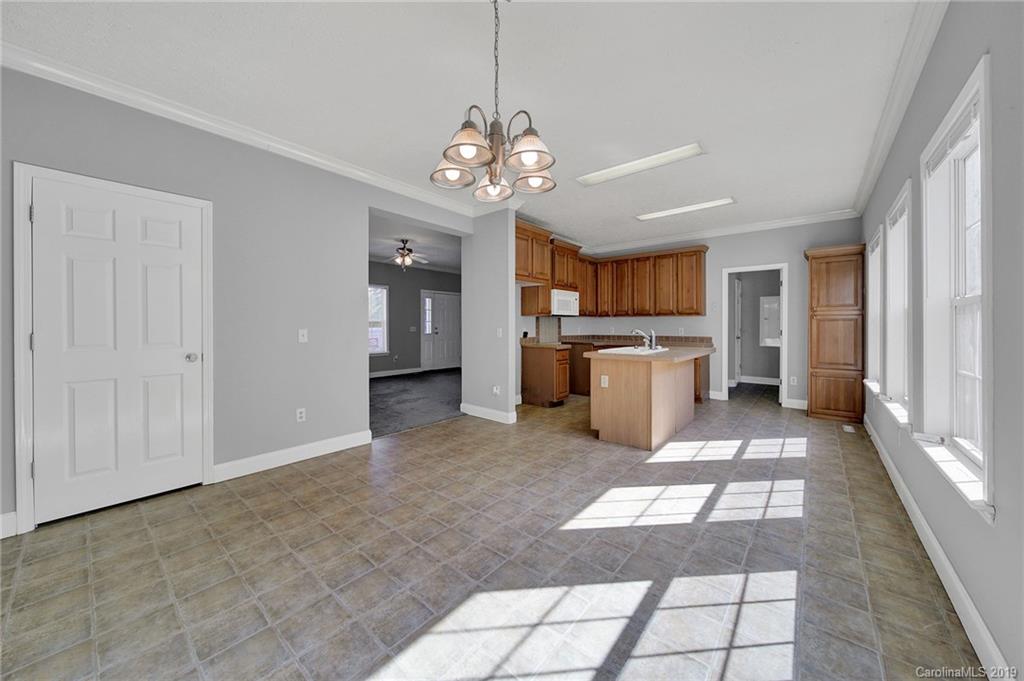 160 North Burris Road Sharon, SC 29742 - Photo 14 of 48 a view of a kitchen with refrigerator and windows
