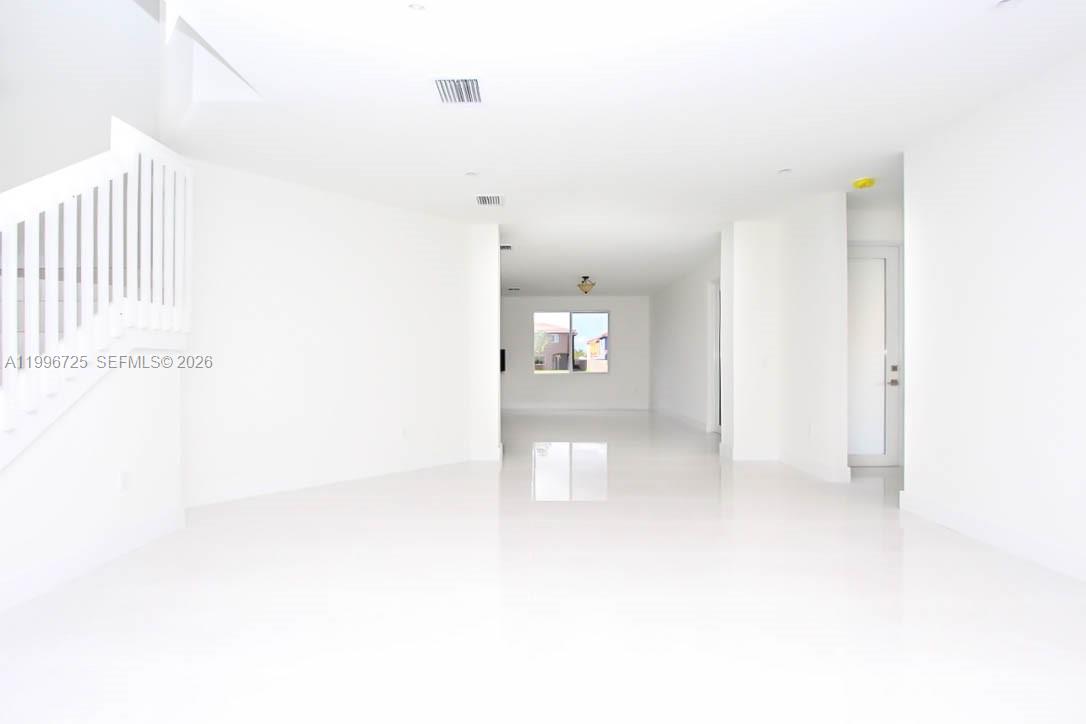 15631 Southwest 11th Terrace Miami, FL 33194 - Photo 12 of 43 a view of an empty room with a window