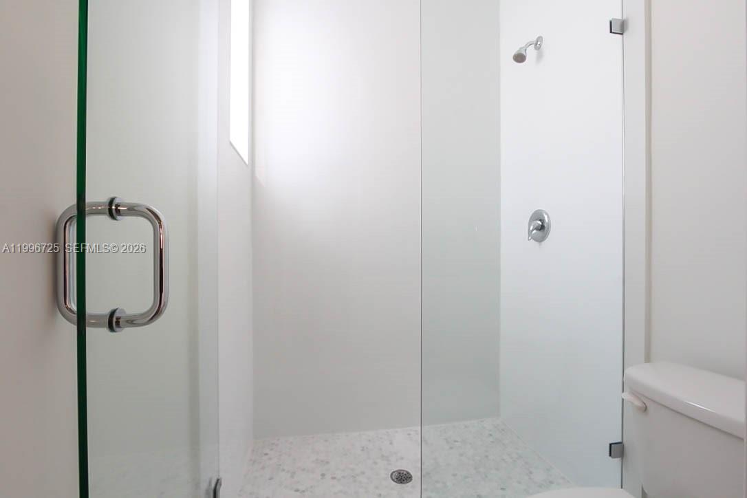15631 Southwest 11th Terrace Miami, FL 33194 - Photo 14 of 43 a bathroom with a shower