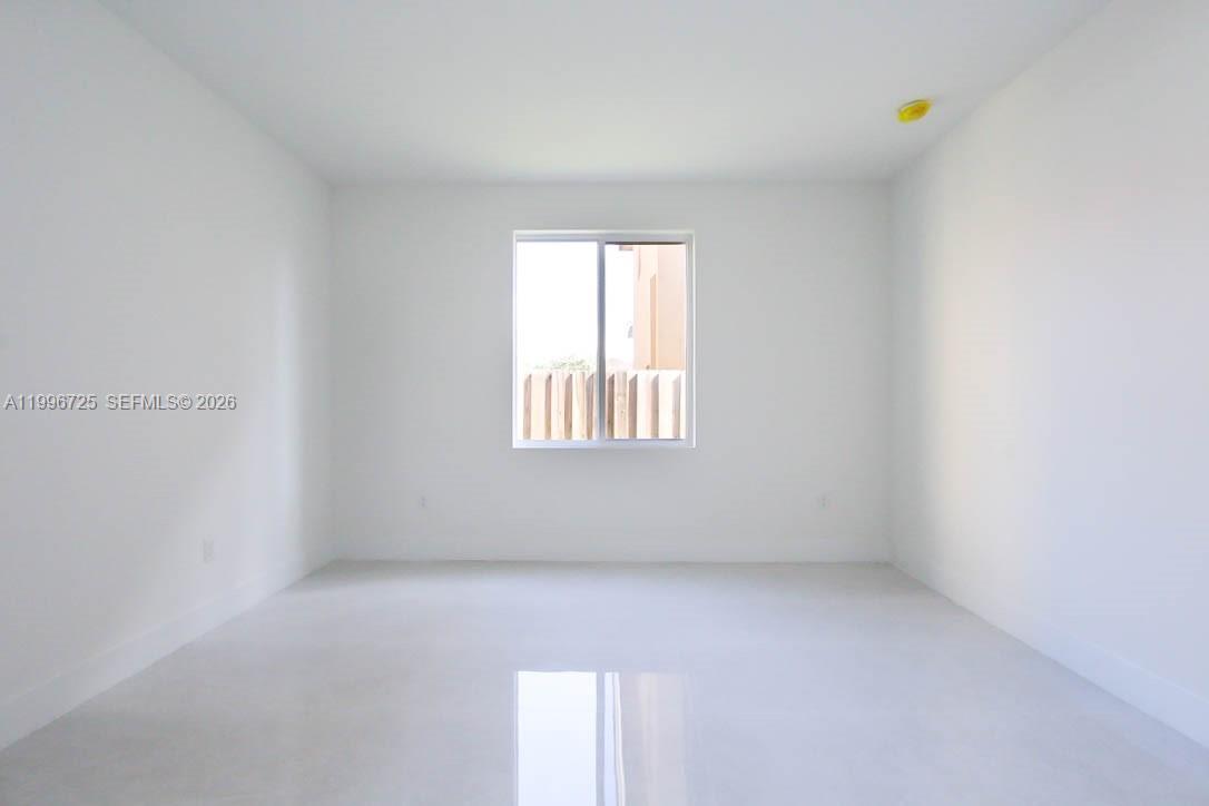 15631 Southwest 11th Terrace Miami, FL 33194 - Photo 16 of 43 an empty room with windows