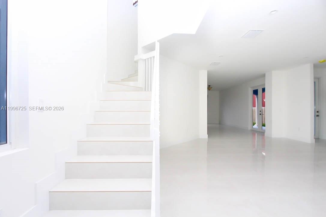 15631 Southwest 11th Terrace Miami, FL 33194 - Photo 30 of 43 a view of staircase with white walls