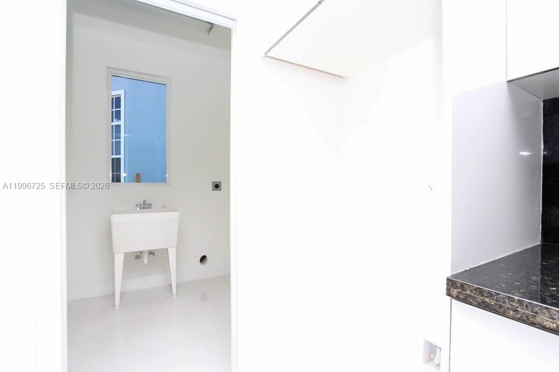 15631 Southwest 11th Terrace Miami, FL 33194 - Photo 39 of 43 a bathroom with a sink and a mirror
