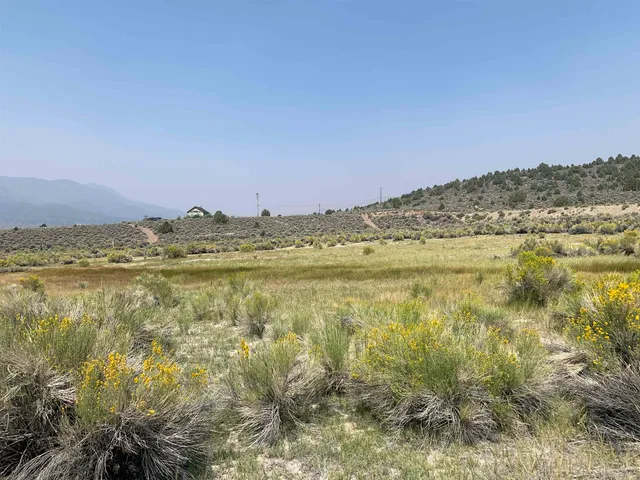 a view of a lake with a mountain in the background