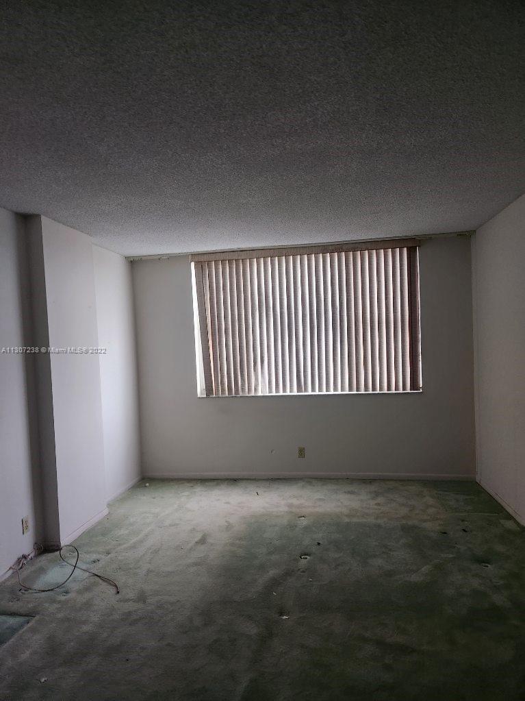 Hillcrest Hollywood, FL 33021 - Photo 4 of 10 a view of an empty room with a window