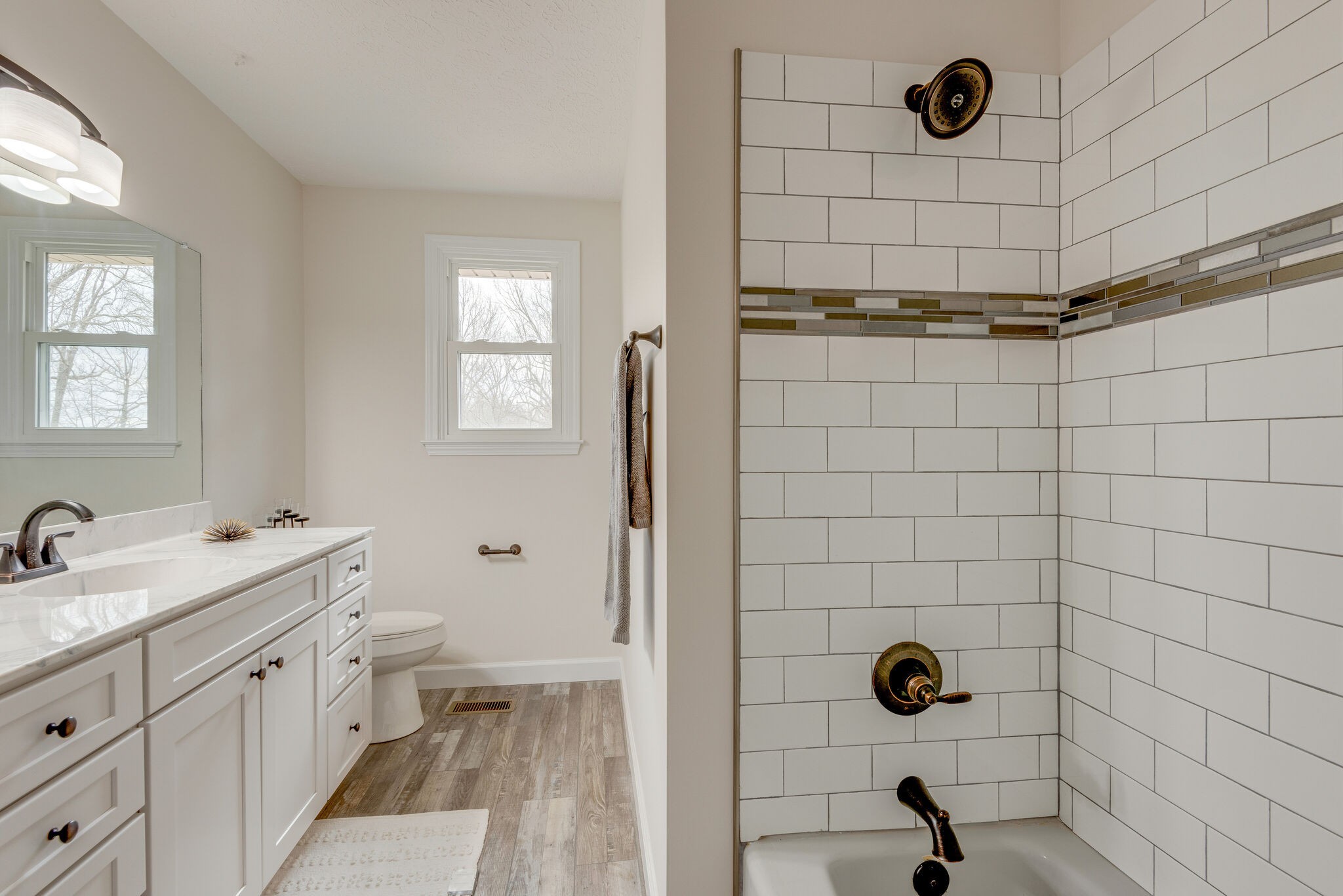 2016 Abiff Road Burns, TN 37029 - Photo 21 of 30 a bathroom with a double vanity sink toilet and shower