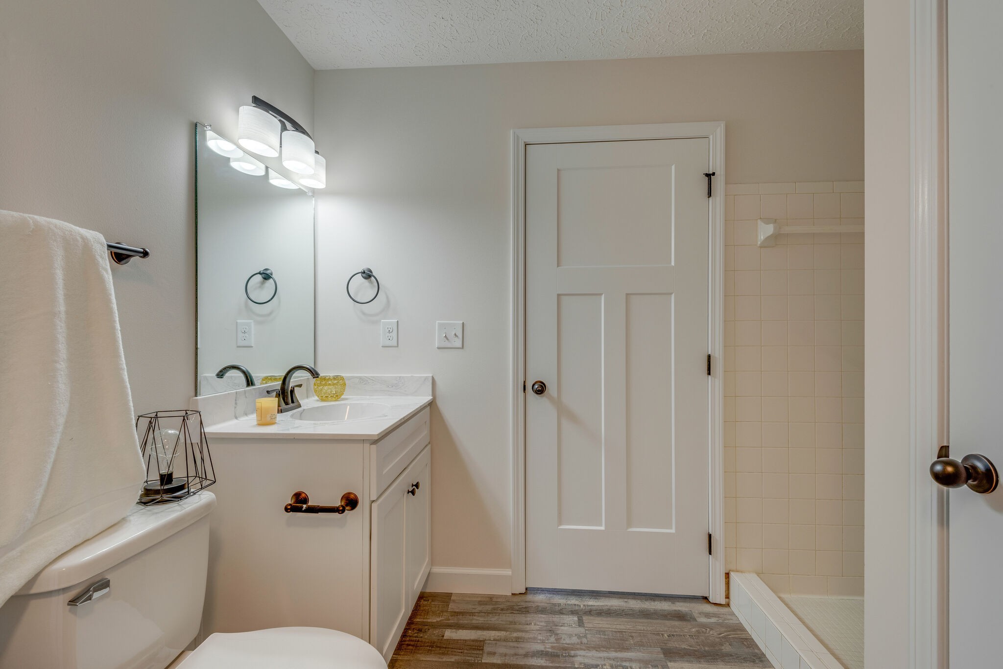 2016 Abiff Road Burns, TN 37029 - Photo 23 of 30 a bathroom with a sink mirror toilet and vanity