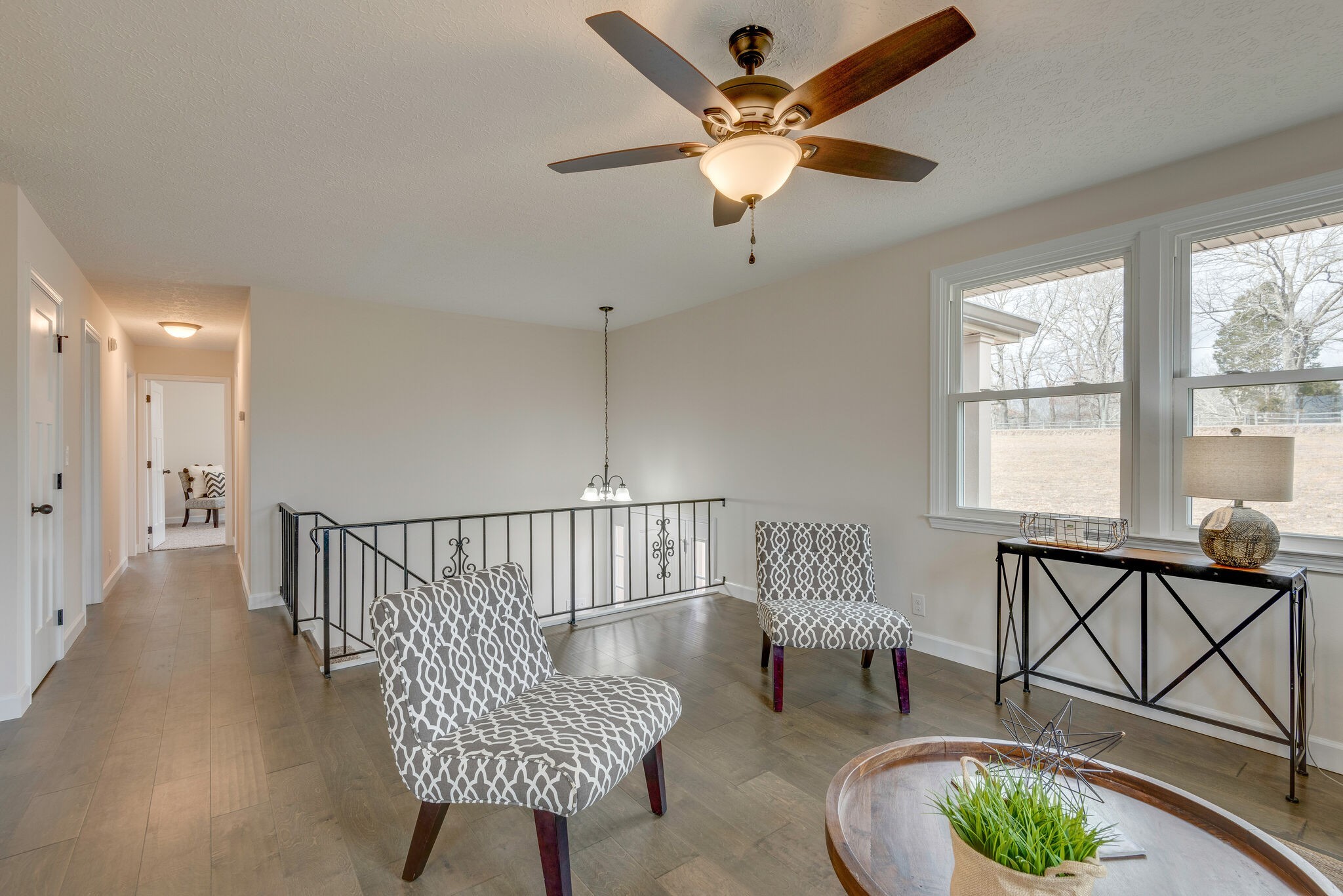 2016 Abiff Road Burns, TN 37029 - Photo 4 of 30 a living room with furniture and a chandelier
