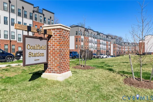 an aerial view of a house with a lake view