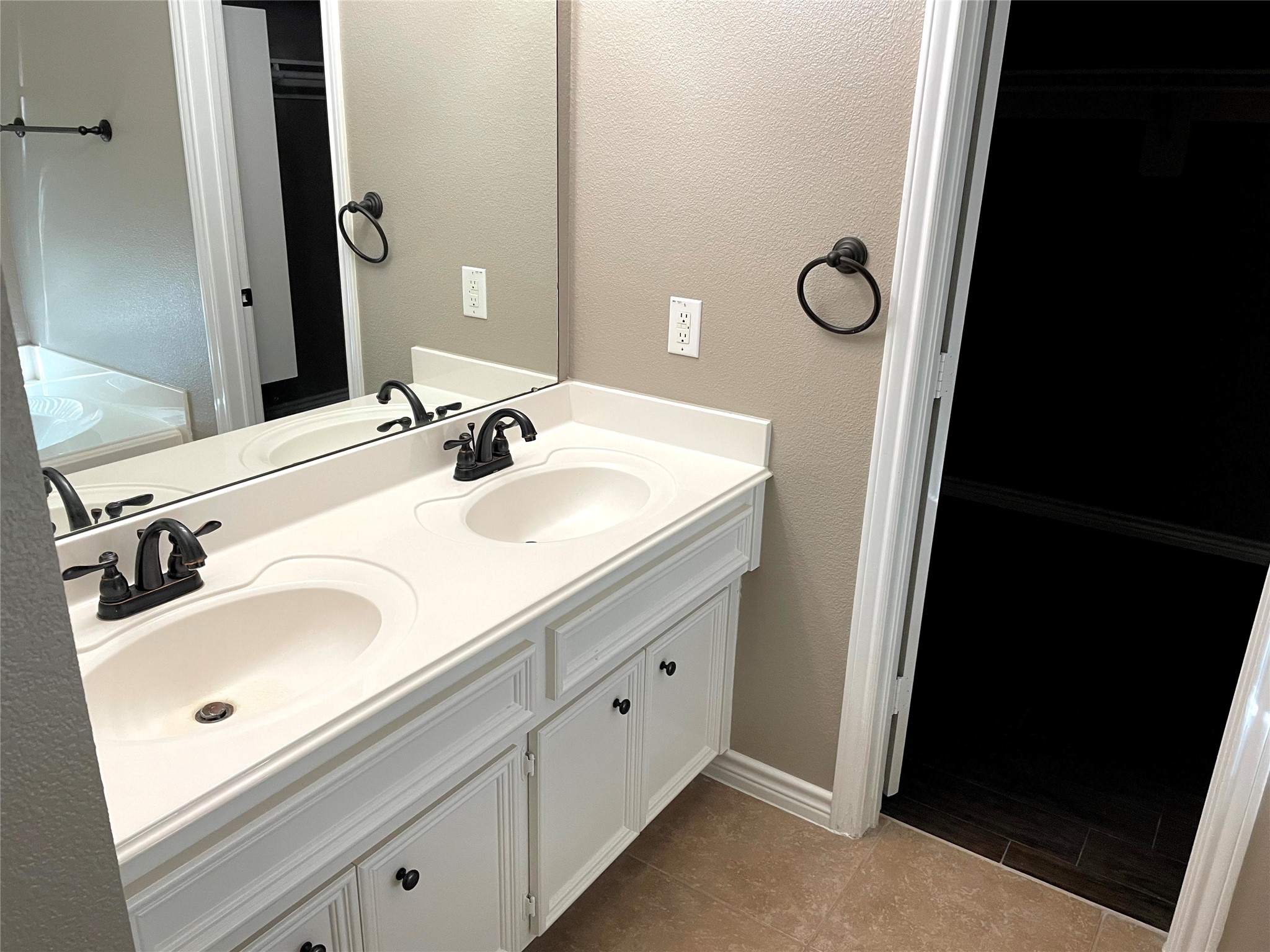 2314 Colonial Springs Lane Spring, TX 77386 - Photo 12 of 22 a bathroom with a sink and a mirror