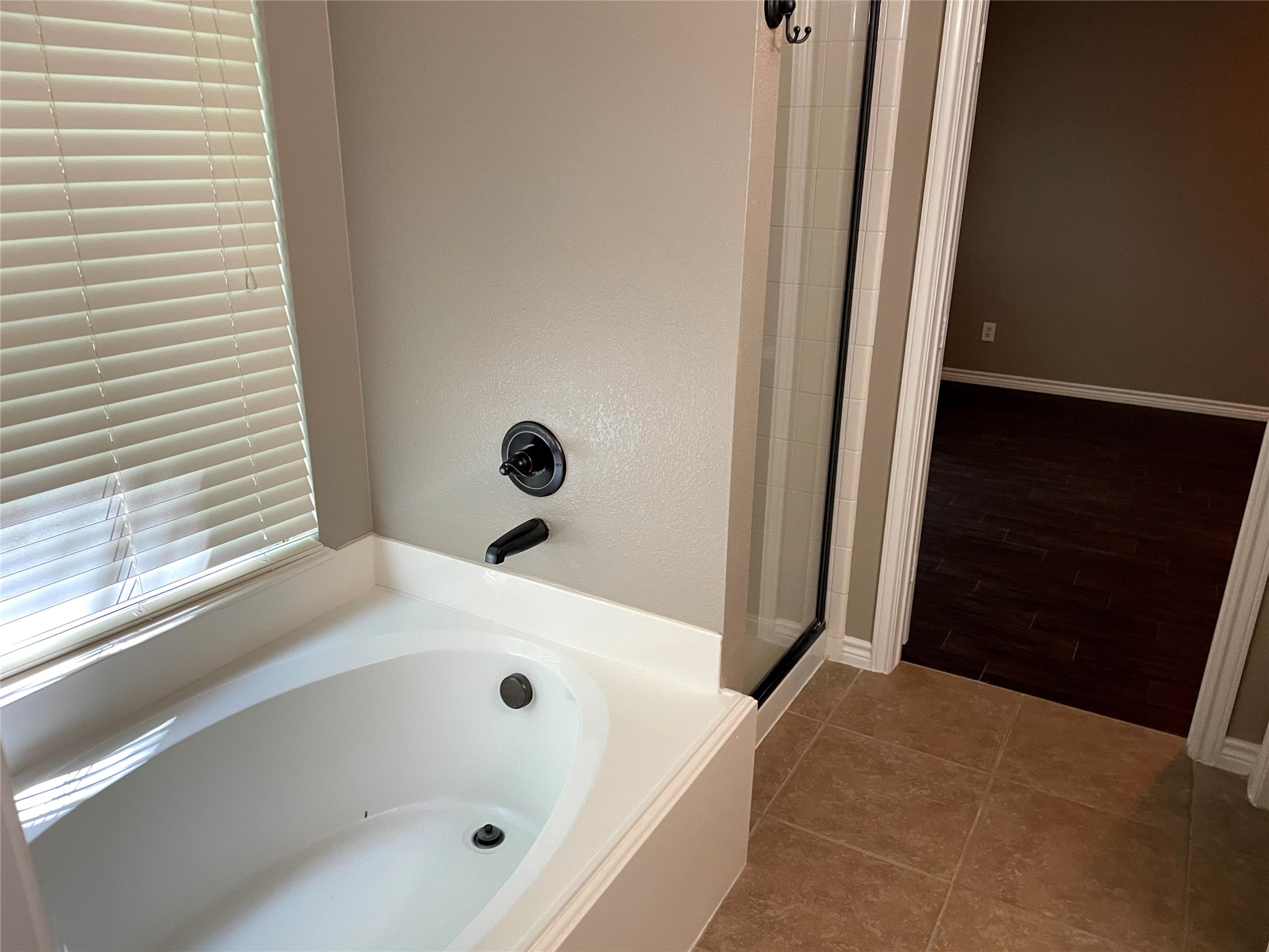 2314 Colonial Springs Lane Spring, TX 77386 - Photo 16 of 22 a bathroom with a tub