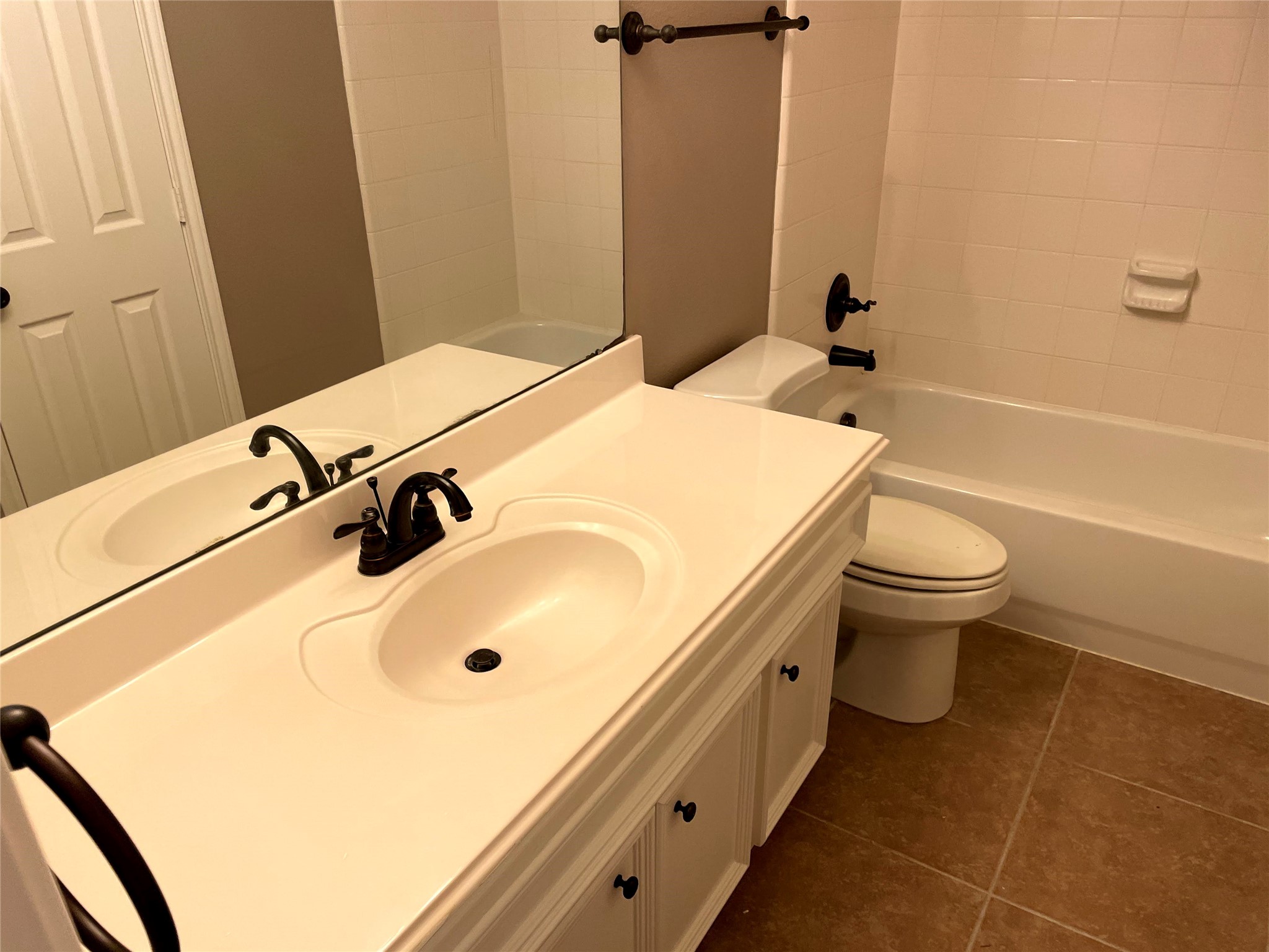 2314 Colonial Springs Lane Spring, TX 77386 - Photo 20 of 22 a bathroom with a sink a toilet and shower