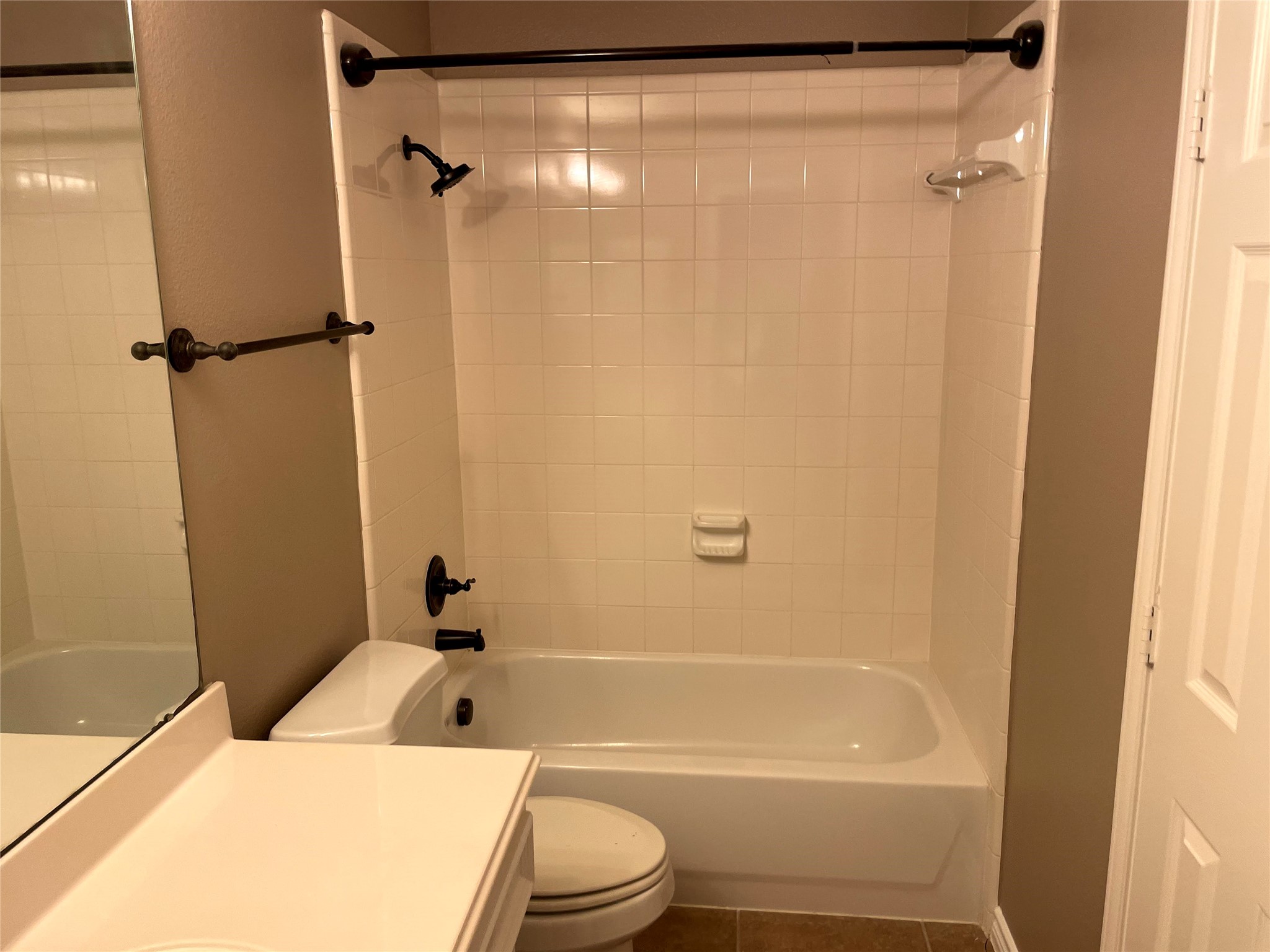 2314 Colonial Springs Lane Spring, TX 77386 - Photo 21 of 22 a bathroom with a granite countertop bathtub shower sink vanity and toilet