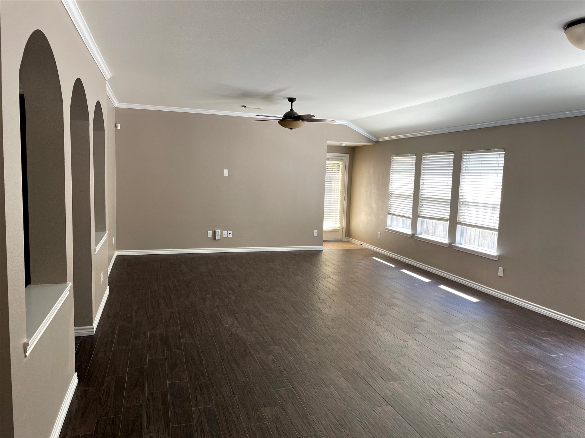 2314 Colonial Springs Lane Spring, TX 77386 - Photo 3 of 22 wooden floor in an empty room with a window