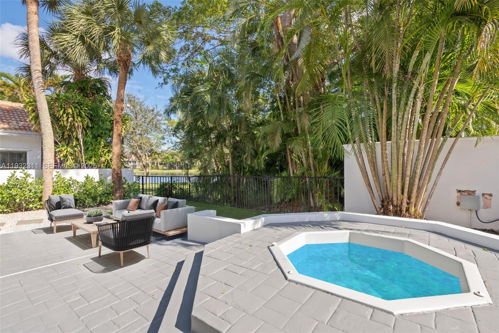 2014 Northwest 52nd Street Boca Raton, FL 33496 - Photo 12 of 26 a view of swimming pool with seating space