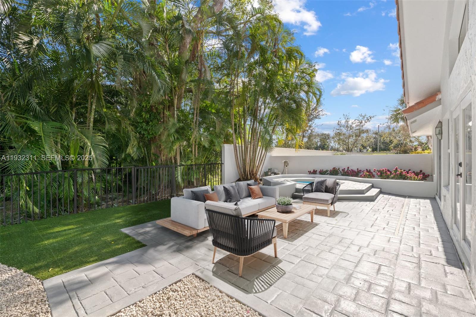 2014 Northwest 52nd Street Boca Raton, FL 33496 - Photo 13 of 26 a view of a patio with chairs and plants
