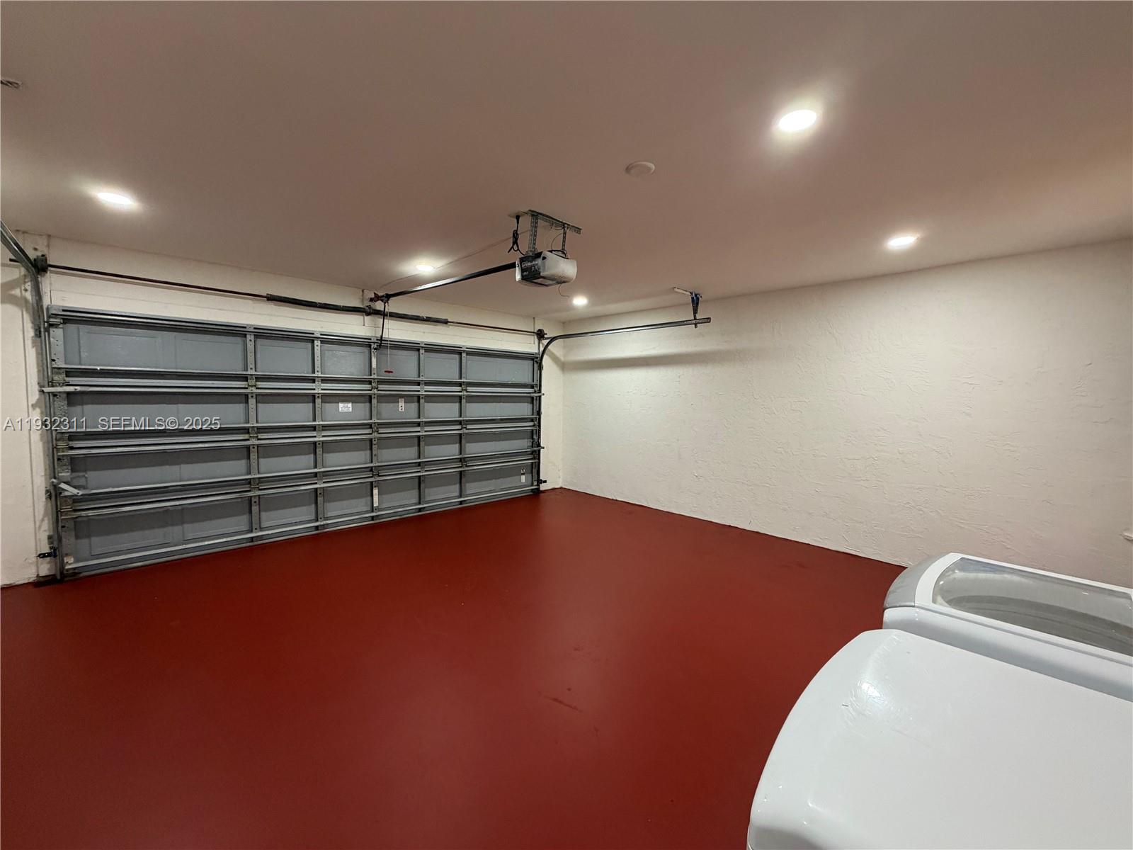 2014 Northwest 52nd Street Boca Raton, FL 33496 - Photo 20 of 26 a view of empty room with wooden floor