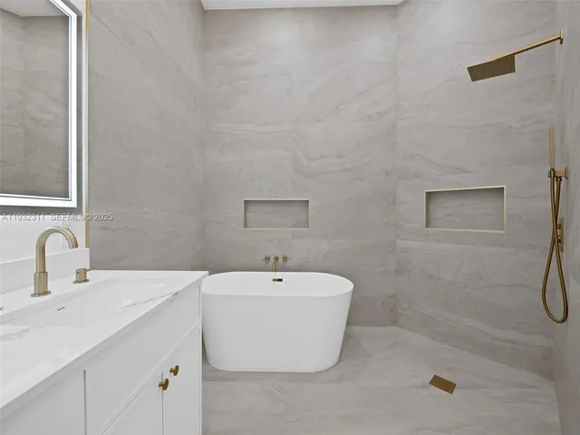 a bathroom with a sink and a bathtub