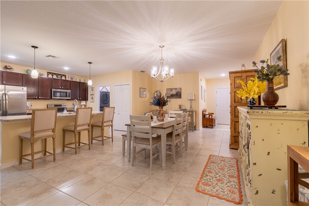 898 Lorca Avenue Sebastian, FL 32958 - Photo 15 of 36 a view of a dining room with furniture