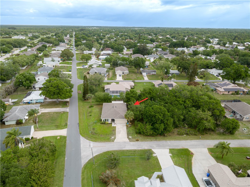 898 Lorca Avenue Sebastian, FL 32958 - Photo 2 of 36 an aerial view of residential house with outdoor space and lake view